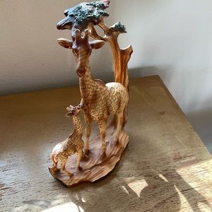 Mother Giraffe & baby under a tree